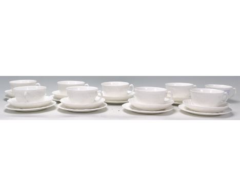 A vintage Wedgwood bone china countryware china tea service consisting of tea cups in the form of moulded leaves with matchin