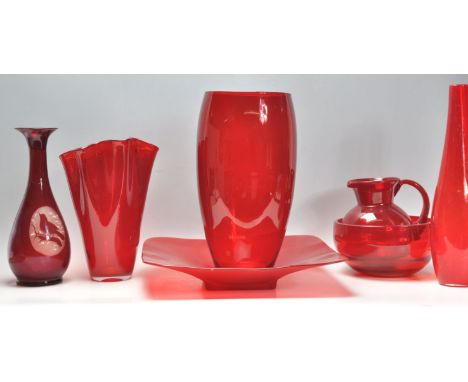 A group of vintage and retro 20th Century studio art glass in cranberry, red and ruby flash red comprising a large table cent