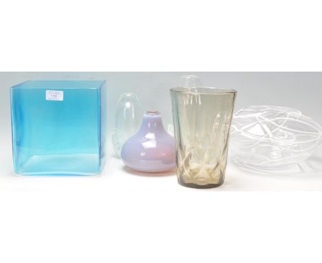 A mixed group of studio art glass vases to include a large square planter example, clear glass vase of bulbous form with whit