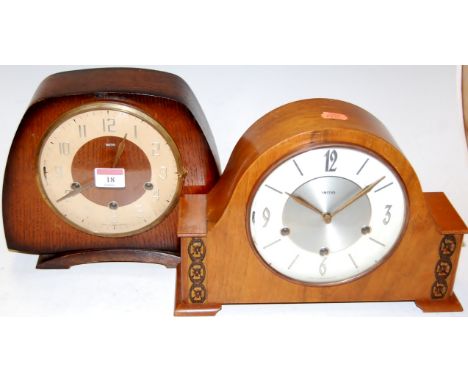 A 1950s Smiths oak cased mantel clock together with one other similar walnut cased example (2)