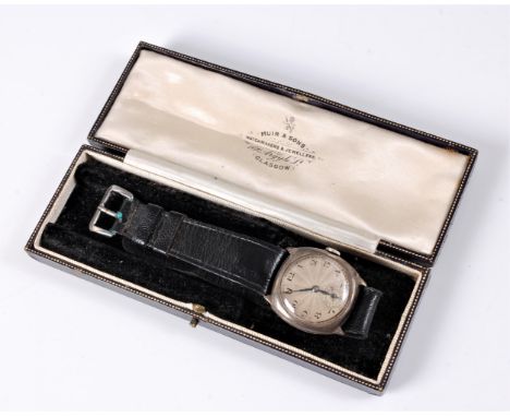 A gentleman's silver case wristwatch, the round engine turned dial with black Arabic numerals and hands, subsidiary seconds, 