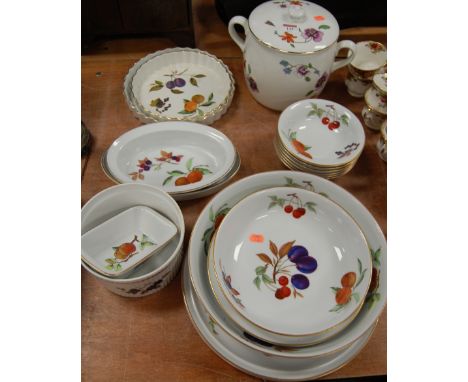 A quantity of Royal Worcester Evesham table wares to include flan dishes, bowls, biscuit jar &amp; cover etc