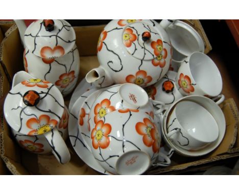 A mid-20th century Limoges part coffee / tea service, on a white ground decorated with pansies, having printed Limoges mark v