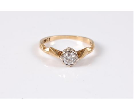 An 18ct diamond solitaire ring, the round brilliant cut diamond, estimated approx. 0.30cts, in collet mount with shaped shoul