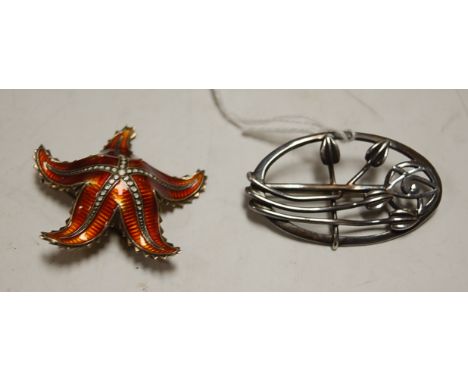A contemporary silver brooch together with a white metal and enamel star fish brooch (2)