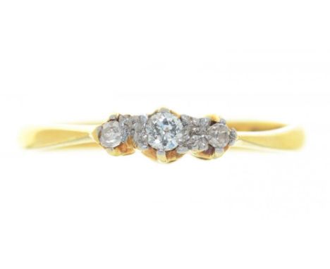 A THREE STONE DIAMOND RING, IN GOLD MARKED 18CT &amp; PLAT, SIZE M, 2G++LIGHT WEAR CONSISTENT WITH AGE 