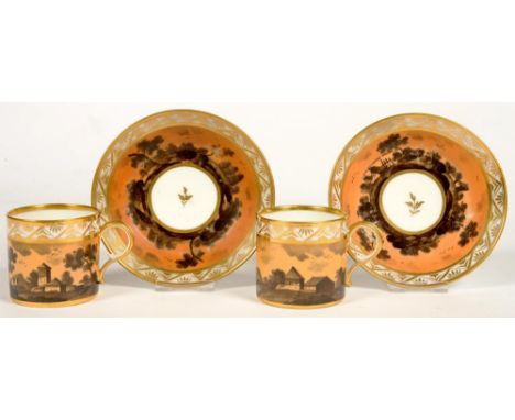 A PAIR OF CONTINENTAL HARD PASTE PORCELAIN COFFEE CANS AND SAUCERS, PROBABLY PARIS, PAINTED IN BLACK MONOCHROME WITH LANDSCAP