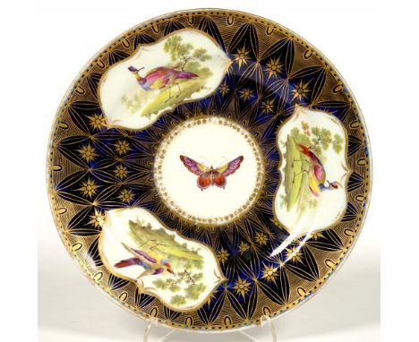 A CHAMBERLAIN WORCESTER RICHLY GILT COBALT GROUND DESSERT PLATE, PAINTED IN THE MANNER OF 'DOCTOR' GEORGE DAVIS WITH EXOTIC B
