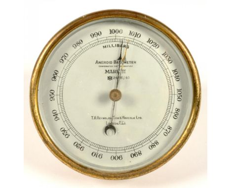 A LACQUERED BRASS ANEROID BAROMETER, INSCRIBED MARK II T A REYNOLDS, SON &amp; WARDALE LIMITED LONDON EC1, 13CM D, C1900