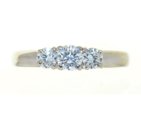 A THREE STONE DIAMOND RING, THE BRILLIANT CUT DIAMONDS 0.55CT, H COLOUR, VS1 CLARITY APPROX, IN PLATINUM, LONDON 2003, SIZE N