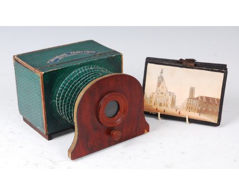 A 19th century French Polyorama Panoptique optical toy, the lithograph paper covered on wood hold-to-light viewer with bellow