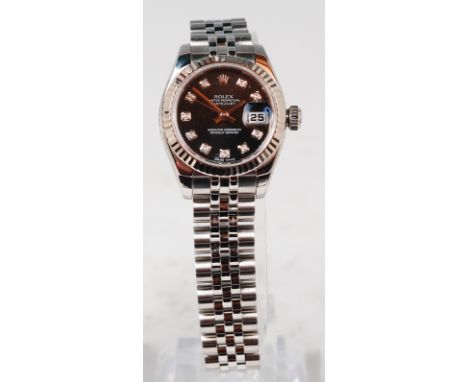 A ladies 18ct white gold stainless steel Rolex Oyster Perpetual datejust bracelet watch, having signed black dial with diamon