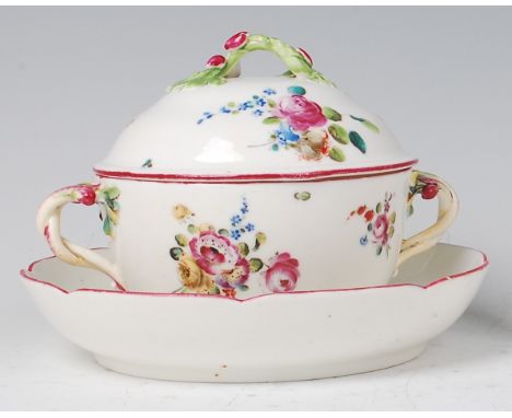 A mid-18th century Mennecy soft paste porcelain sucrier and cover on stand, polychrome enamel decorated with sprays of flower