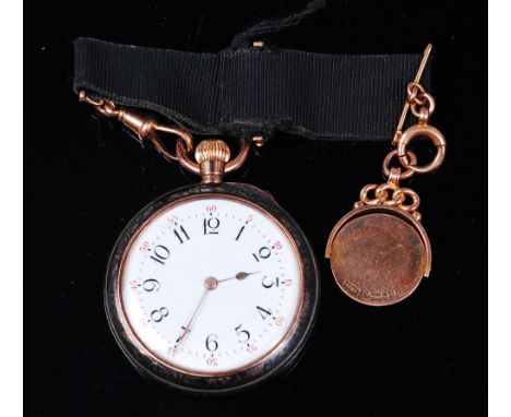 An early 20th century continental silver and niello open faced pocket watch, having white enamel dial, Arabic numerals and ou