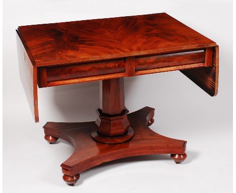 A William IV mahogany pedestal sofa table, having twin blind frieze drawers over a quatraform base, w.94cm (leaves down), d.6