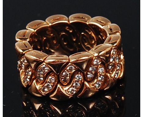 A Bulgari 18ct gold and diamond set ring, each co-joined circular section pavé set with two rows of three small brilliants, s