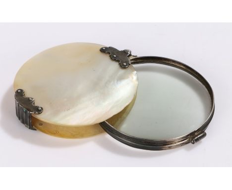 18th Century silver and mother of pearl pocket lens, of circular form with hinged lens, 6.5cm diameterfault to the surface of