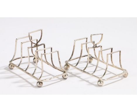 Pair of Victorian silver toast racks, Birmingham 1898, maker Haseler Brothers (Edward John Haseler &amp; Noble Haseler), the 