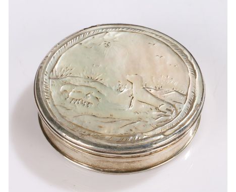 18th Century silver and mother of pearl snuff box, of circular form, the lid carved with a sheepdog and his flock, 4.5cm diam