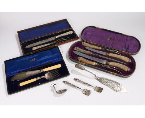 Cased carving set with antler handles and silver mounts, cased set of bone handled fish servers, cased carving set, small pai