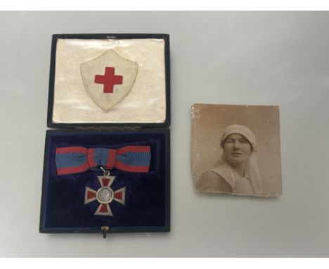 Royal Red Cross 2nd class GVR, silver and enamel in original Garrard box with photograph of recipient and cloth badge