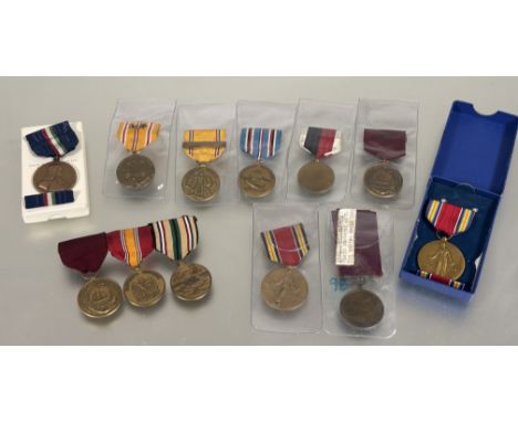 USA Naval Long Service group of three L.S.G.C. National Defence and Southwest Asia medal together with a boxed WWII Victory m