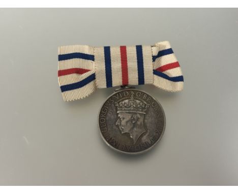 King's medal for Service in the Cause of Freedom. Silver, unnamed suspended on lady's bow