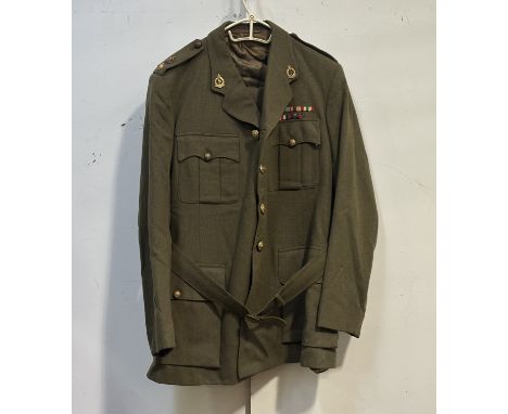 Mixed uniforms: Army chaplin's tunic and cap, J.C.SMITH Ltd. REV. H.G. REID 2.10.39, R.A.M.C. Lt Col's tunic and trouser, Q.A