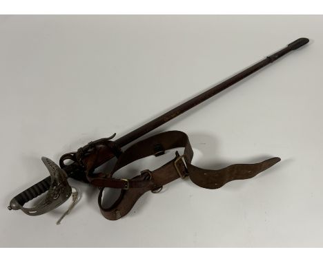 1897 Officer's pattern sword in leather scabbard with leather frog and Sam Brown belt