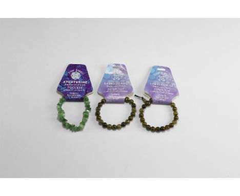 A group of three bracelets, two polished labradorite bead bracelets and one 'tumblestone' aventurine pebble bracelet; all on 