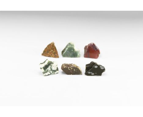 A group of six mineral chunks including: jasper, tree agate, calcrete, basalt, moss agate, snowflake obsidian, each with iden