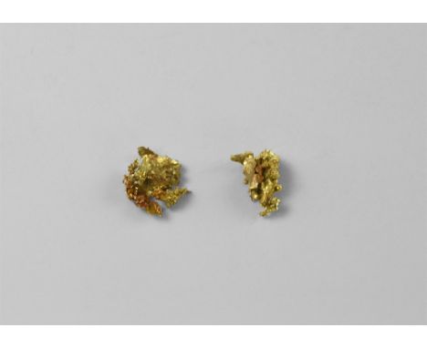 Two pieces of native gold mounted in a perspex display box. See Bonewitz, Dr. Ronald Louis, Rocks & Minerals, 2008, p.114-115