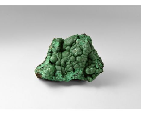 A fine specimen of botryoidal malachite on ironstone from the Democratic Republic of the Congo, with numerous bubble-like str