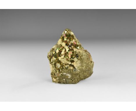 A large and attractive specimen of pyrite, comprising lustrous and well-formed pyrite cubes on a matrix of massive pyrite, wi