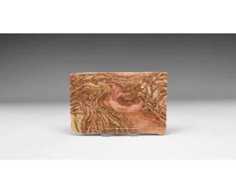 An unusually patterned slab of picture sandstone from Utah, USA, with numerous swirls and layers highlighted in iron oxide mi