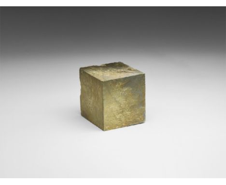 A large cube of pyrite with evenly formed faces and a metallic lustre. See Bonewitz, Dr. Ronald Louis, Rocks & Minerals, 2008