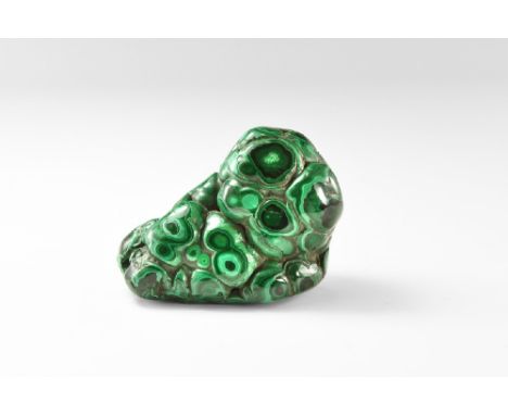 A polished piece of beautifully figured malachite, with numerous 'eyes' exposed on the polished surface. See Bonewitz, Dr. Ro