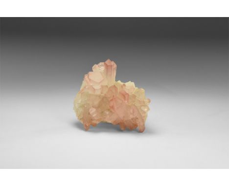 An unusual formation of quartz crystals, each crystal tipped with a coating of pinkish amethyst. See Bonewitz, Dr. Ronald Lou