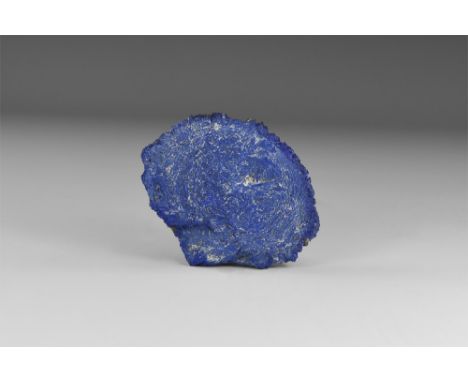 A fan shaped sheet of azurite of a deep blue colour with darker blue cubic crystals to the edge. See Bonewitz, Dr. Ronald Lou