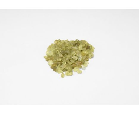 A group of small, gemmy yellow-green chrysoberyl pieces. See Bonewitz, Dr. Ronald Louis, Rocks & Minerals, 2008, 159. 55 gram