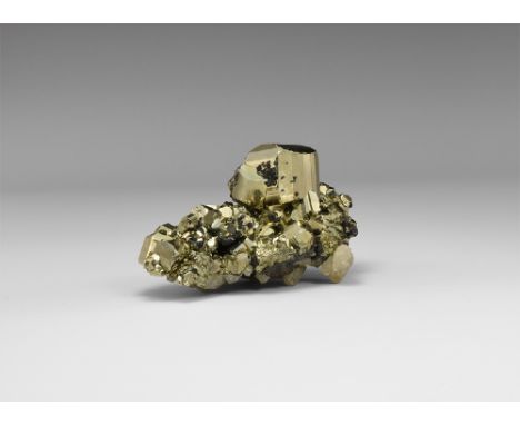 A group of fine pyrite crystals form the classic Peruvian locality, crystallising principally as cubes modified by octahedron