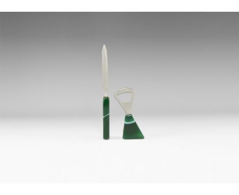 A paper knife and bottle opener with carved and polished green agate handles; possibly colour enhanced. See Bonewitz, Dr. Ron