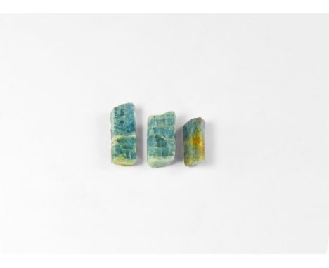 A group of three blue aquamarine crystals of good prismatic form, in white card tray. See Bonewitz, Dr. Ronald Louis, Rocks &