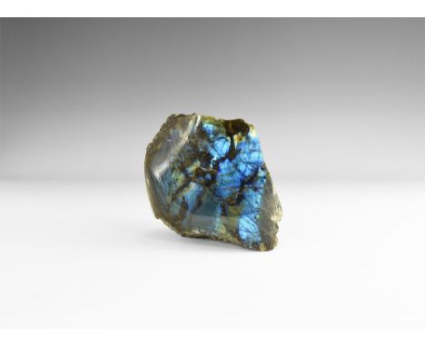 A large polished boulder with rich colour play on most faces, principally blues and golds. See Bonewitz, Dr. Ronald Louis, Ro