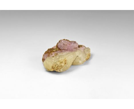 A rare combination of eosphorite on rose quartz, itself on quartz, the rose quartz forming rare crystals, from Taquaral, Mina