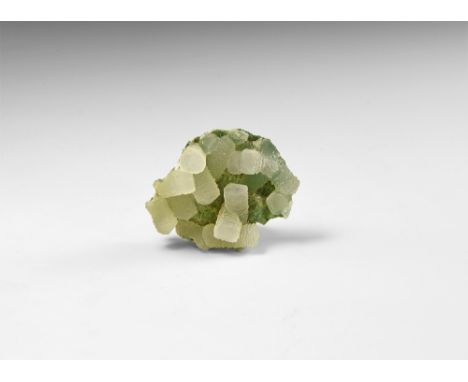 A curious group of calcite crystals, with each column of crystals composed of numerous 'nailhead' calcite crystals stacked on