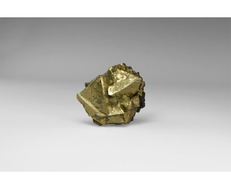 A group of fine pyrite crystals form the classic Ancash Province, Peruvian locality, crystallising principally as well-develo