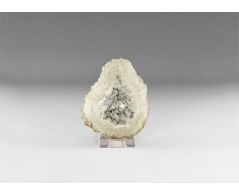 A tray carved from an agate nodule, with quartz crystal rim; colour enhanced. See Bonewitz, Dr. Ronald Louis, Rocks & Mineral