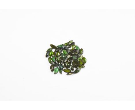 A group of fifty marquise cut green tourmaline gems. See Bonewitz, Dr. Ronald Louis, Rocks & Minerals, 2008, p. 15 grams (75 