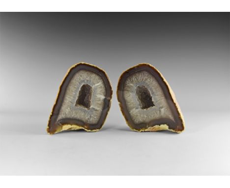 A superb sawn agate geode pair, with an initial layer of blue-grey agate followed by a filling of quartz crystals, with a hol